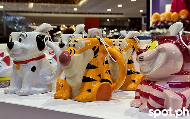 Cute mugs at Disney Store.